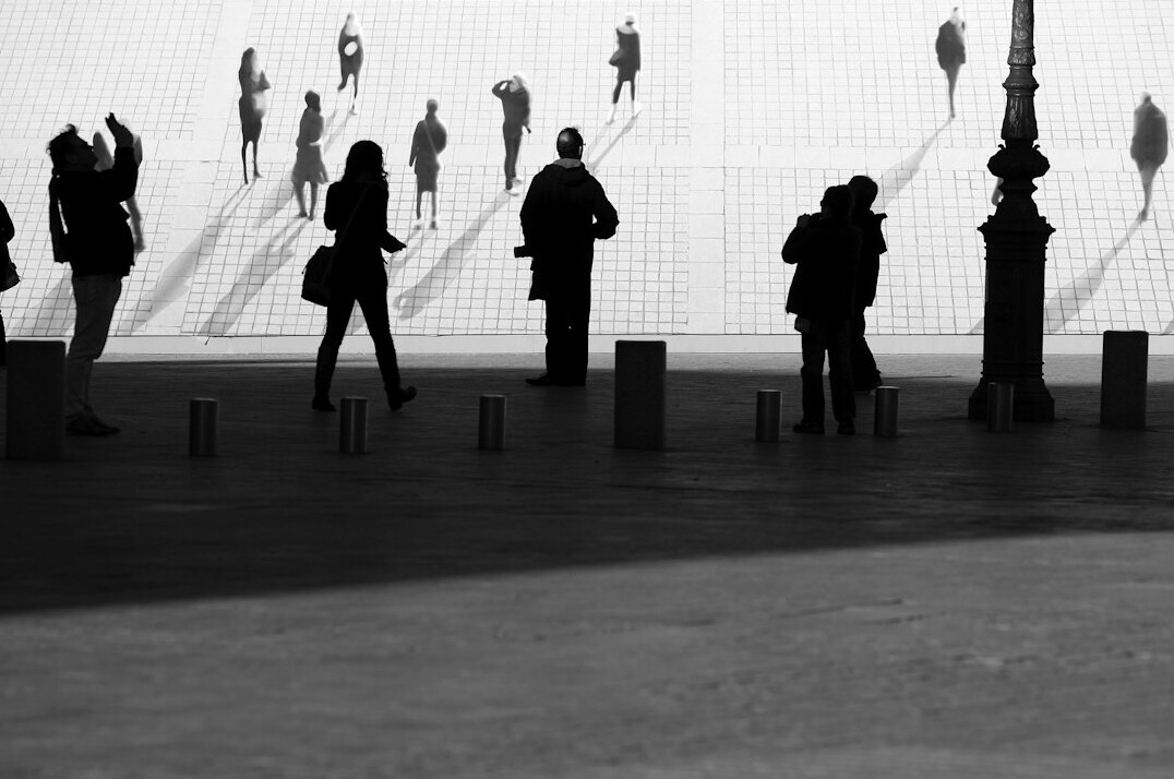people behind facade