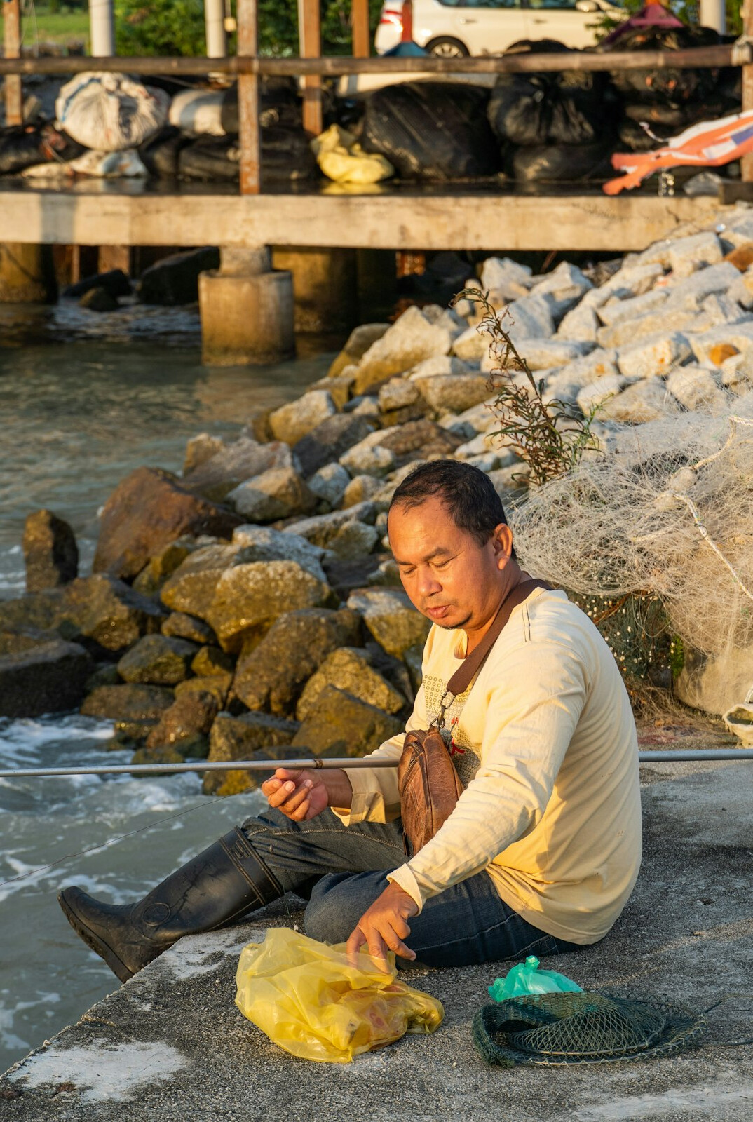 fisherman mending nets